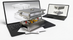 Metal fabrication press stacked with plates on a laptop, CAD models visible on both screens as overlay diagrams
